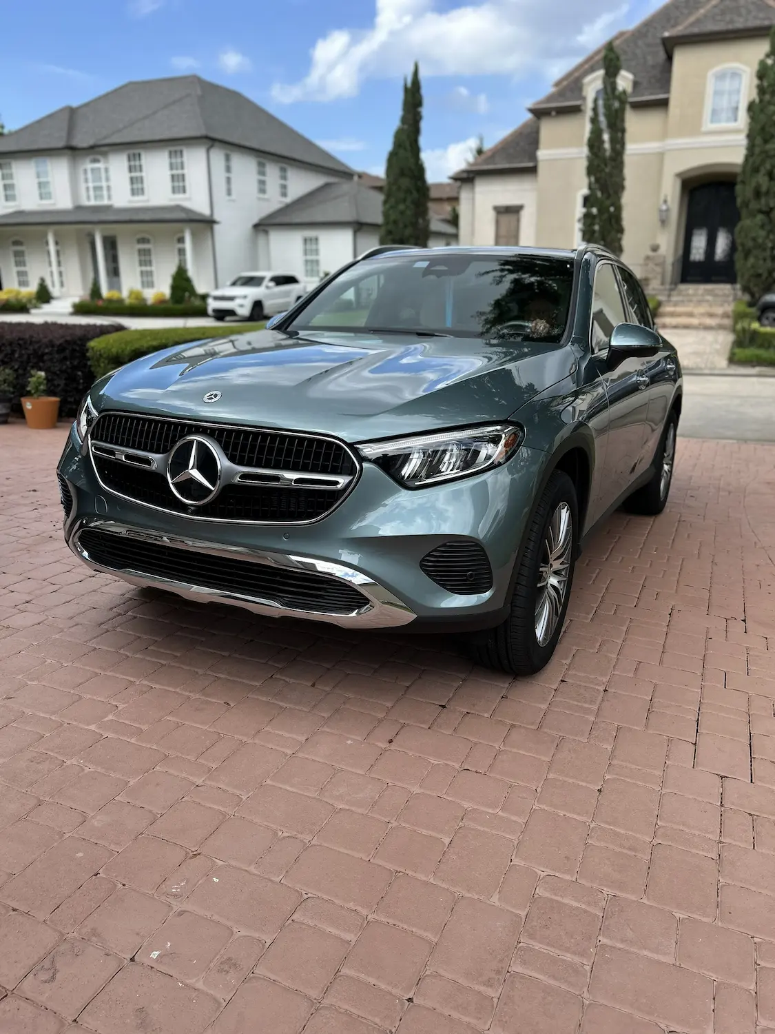 Mercedes-Benz GLC detailed in a Kenner driveway with mirror-gloss paint after mobile detailing
