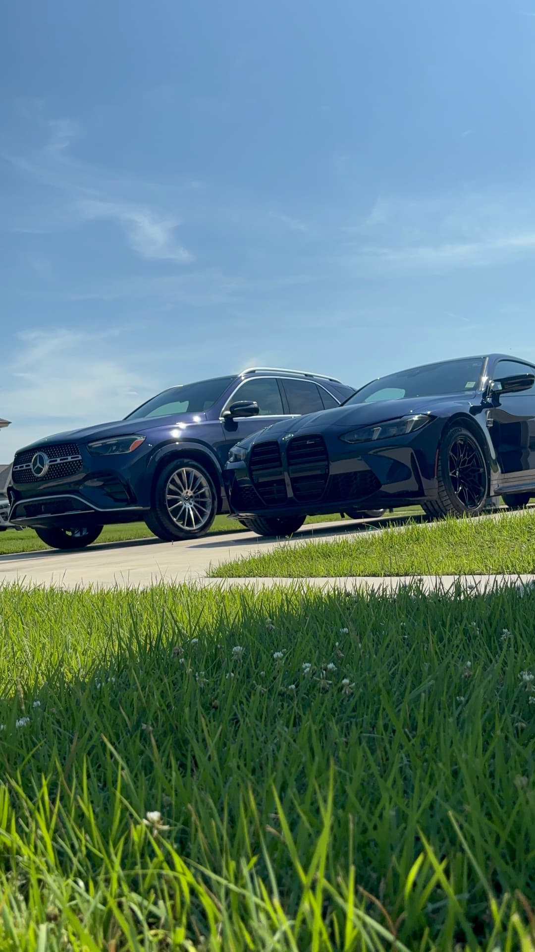 Mercedes-Benz GLE and BMW M4 Competition with mirror-gloss black paint after mobile detailing in Gonzalez, Louisiana