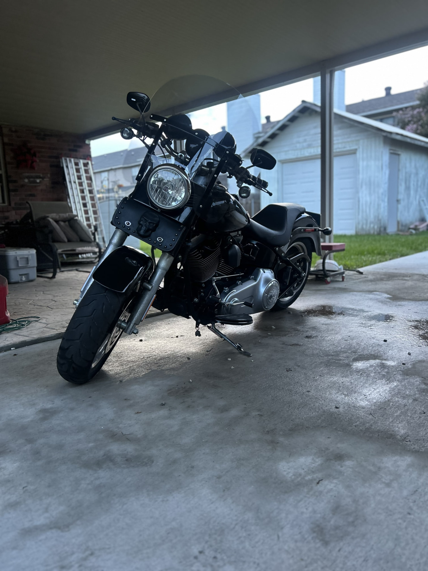 Harley-Davidson Softail motorcycle detailed under a carport in LaPlace, Louisiana